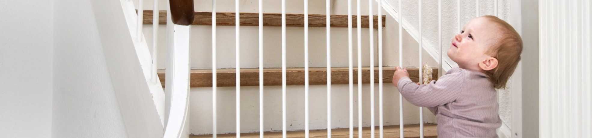 BabyDan flex fit gate in white as shown at the bottome of stairs
